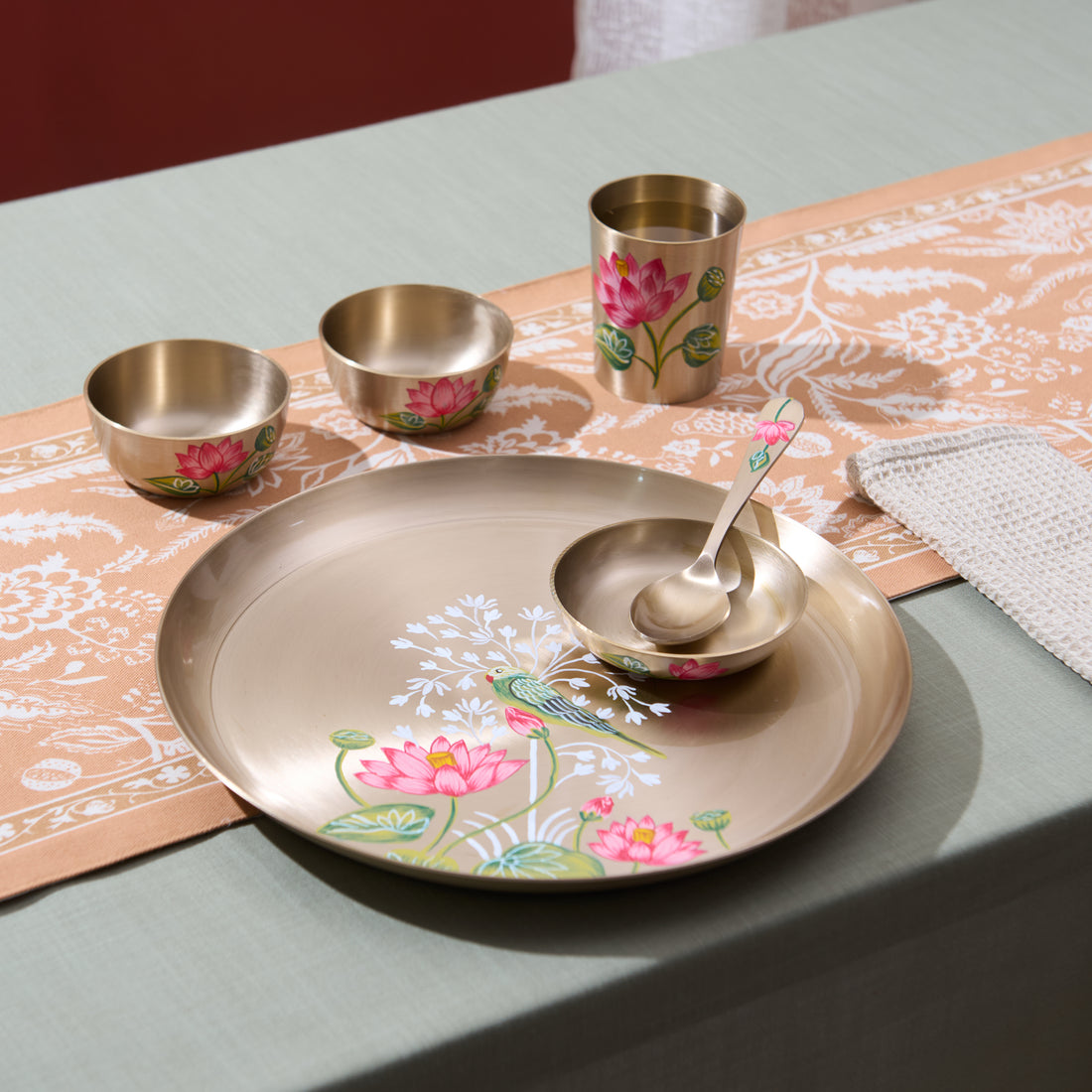Hand-painted Parrot & Lotus kansa set on the table