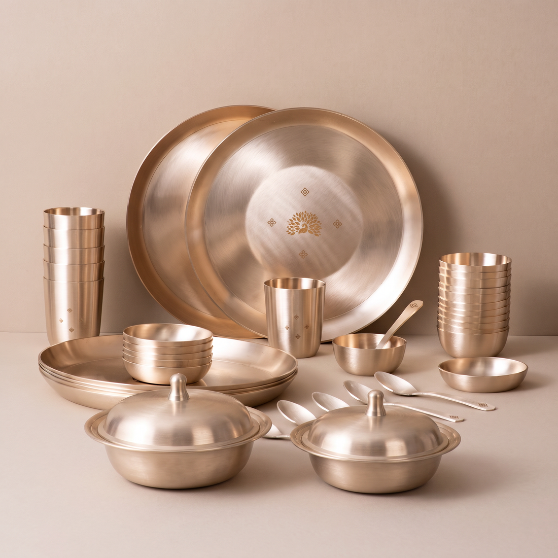 Peacock Motif 40-piece kansa dinner set with serving bowls